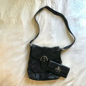Coach Black Crossbody Bag with Adjustable Strap and Metal Accents